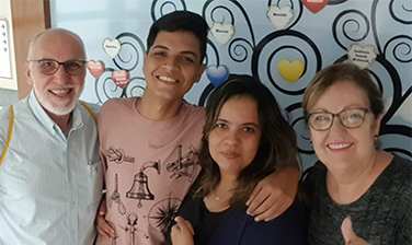 An RMHC family, the de Araujo Moeiras, Juan Carlos at 18 years old in left-center, surrounded by three family members
